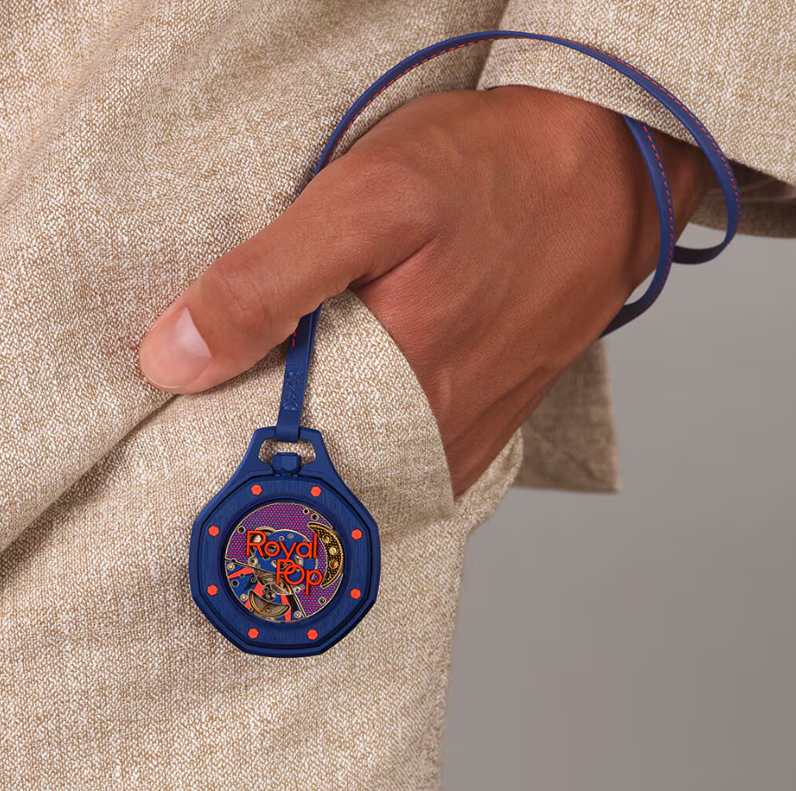 Royal Pop pocket watch worn with a blue lanyard